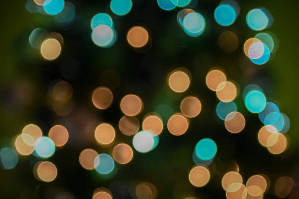 blurry holiday lights alluding towards 3 acupressure points to calm anxiety