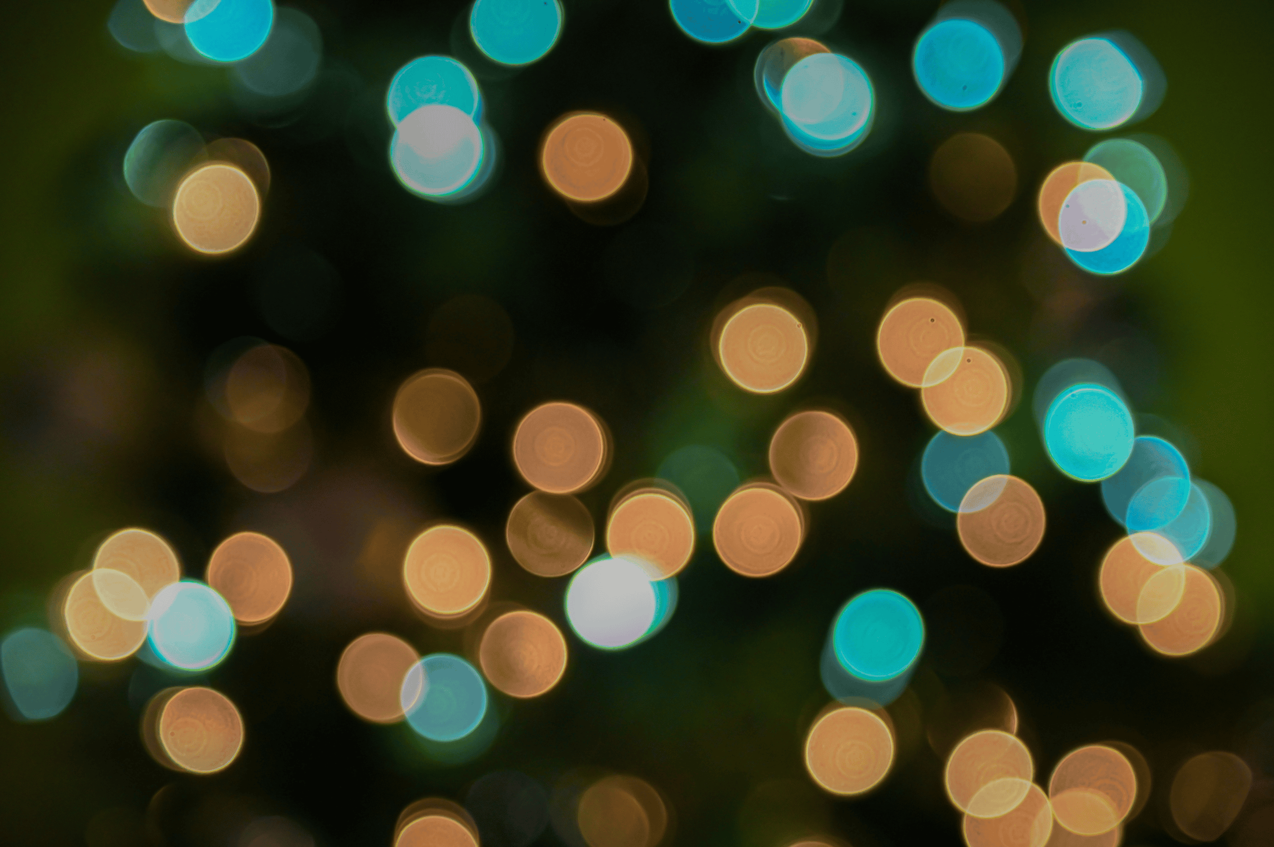 blurry holiday lights alluding towards 3 acupressure points to calm anxiety